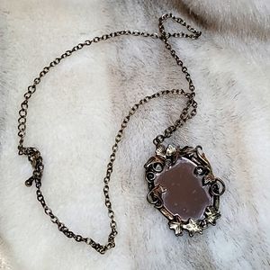 Alice and wonderland necklace mirror